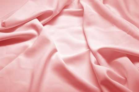 Abstract background, red silk fabric with waves. Shallow DOFの写真素材