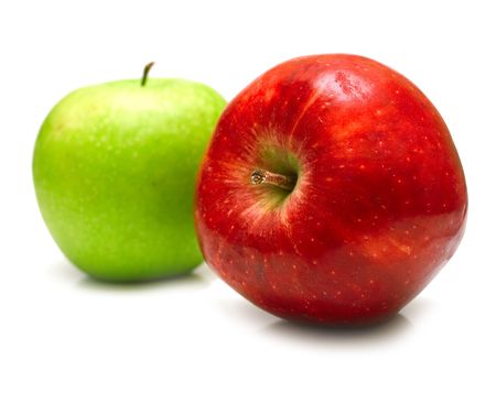 Red and green apples on the white background. Isolated. Shallow DOFの写真素材