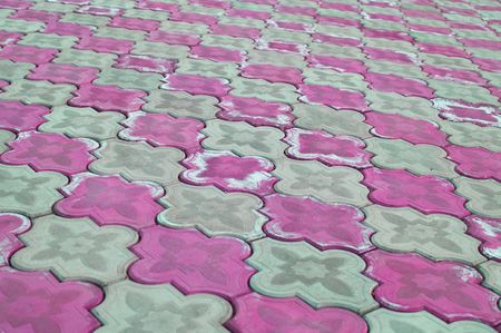 Sidewalk pattern of grey and pink colors. A background. Shallow DOFの写真素材