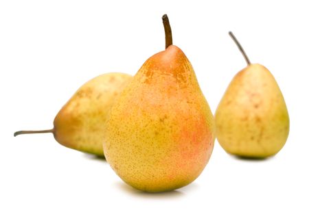 Juicy ripe yellow pears on white background. Isolated. Shallow DOFの写真素材