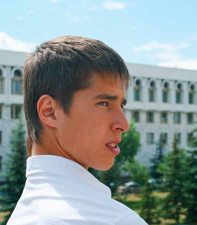 Portrait of the young men against urban landscapeの写真素材