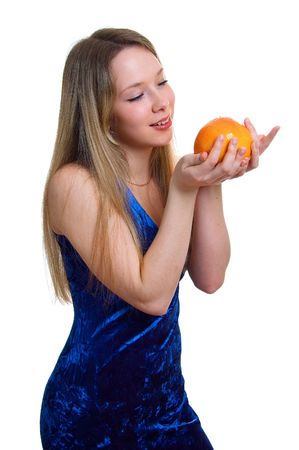 The young beautiful girl with orange grapefruit on hand. Isolation on a white backgroundの写真素材
