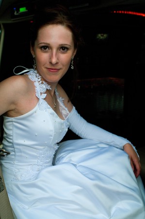 The young beautiful bride in the car. Shallow DOF の写真素材