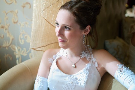 The young beautiful bride in a wedding dress. Shallow DOF の写真素材