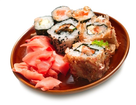 Japanese sushi rolls in plate on white background. Isolation, shallow DOF の写真素材