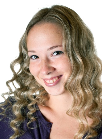 The young beautiful girl in a lilac shirt. Isolation on a white background の写真素材