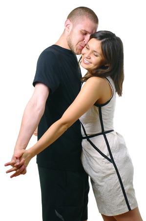 Portrait of young happy smiling attractive couple, isolated on white backgroundの写真素材