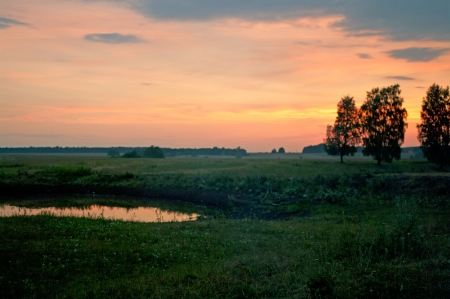 The beautiful sunset on the lake. Shallow DOF の写真素材