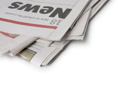 A pile of newspapers isolated on white. The news headlines are at the top of the pile. See more...