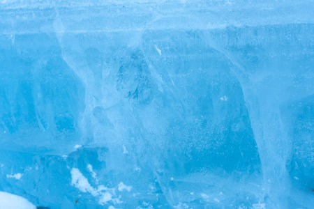 Abstract Blue Ice Texture Shimmers: Frozen Water Beauty, Cold Winter Wonder, Nature's Artistry...