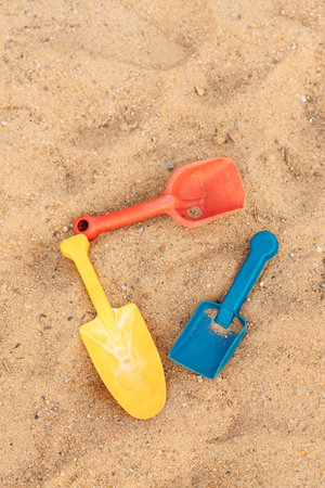 childrens paddles in the sandの写真素材