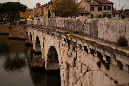 Discover the iconic Ponte di Tiberio, a Roman bridge spanning the River Marecchia in Rimini, Italy. Built in 20 AD, this majestic structure is a testament to Roman engineering and a must-seeの写真素材
