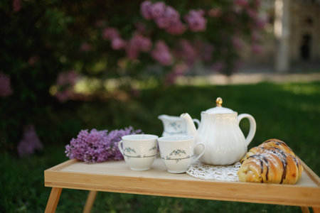 Lovely Lilac Blooms Accentuate Perfect Picnic Sceneの写真素材