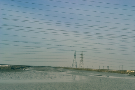 Power Lines above the pondの写真素材
