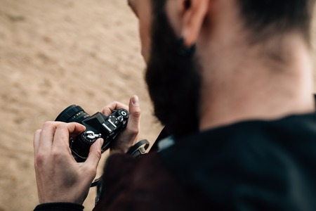 the guy photographed on the beachの写真素材