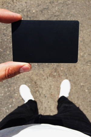 a blank credit card in your handsの写真素材