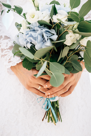 bouquet of the bride in hands, eucalyptusの写真素材