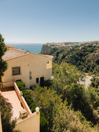 Enjoy the breathtaking and stunning coastal view that can be seen from the hillside villaの写真素材