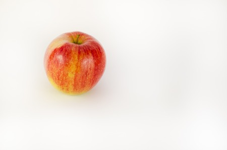 Fresh red apple on a white backgroundの写真素材