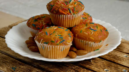 Cupcakes with orange icing on top