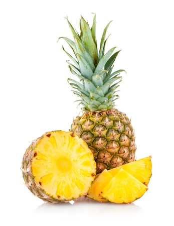 pineapple with slicesの写真素材