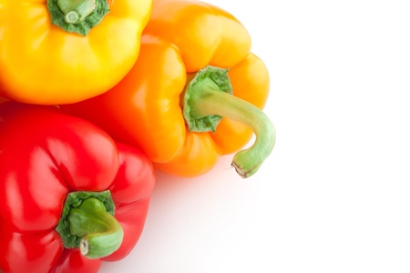 colorful paprika peppers isolated on white backgroundの写真素材