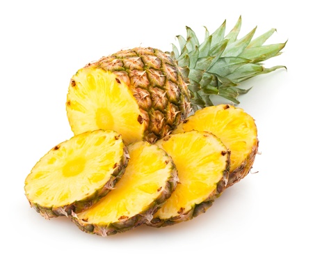 pineapple with slicesの写真素材