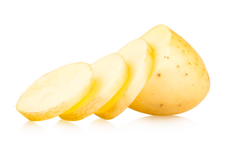 sliced potato isolated on white backgroundの写真素材