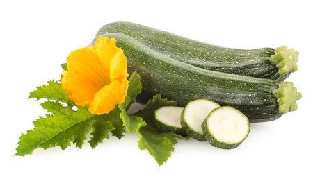 Zucchini with flower and leaves isolated on white backgroundの写真素材
