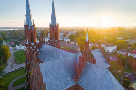 Old catholic church in Vidzy (Belarus) in the morningの写真素材