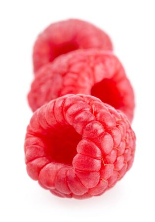 Ripe raspberries isolated on white backgroundの写真素材
