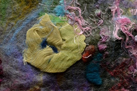 Compressed natural silk yellow matted with hair color in fabricの写真素材