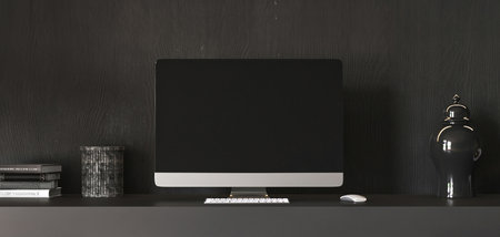 Gray home interior office with wooden dark table, computer screen and decor book in minimal modern...