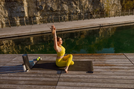 Experience the calming and enriching Outdoor Yoga Practice by the Water, surrounded by nature