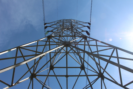 Big electric pole, insulated against the sky.の写真素材