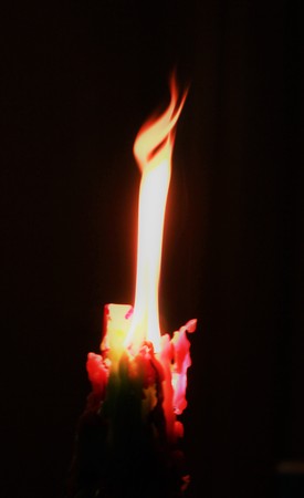 The candle on black background. Cathedral, the truth to see eternity. You can watch the Fire forever! Truth know at the candle flame!の写真素材