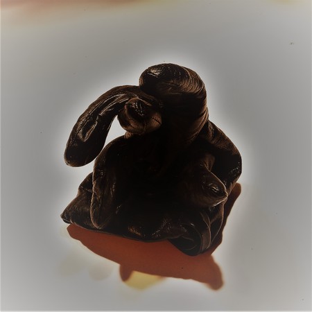 Black woven fabric. Futuristic gloss black matter. Black woven cloth monster on a white background. Black woven cloth on a white background. Black woven fabric in green tones on a white background. Black woven cloth monster Kruger on a white background.の写真素材