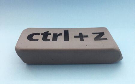 eraser with the inscription "ctrl + z" on a blue backgroundの写真素材