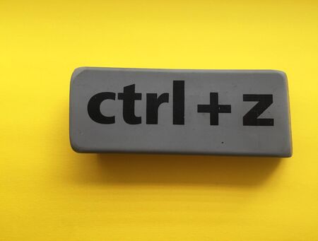 eraser with the inscription ctrl + z on a yellow background