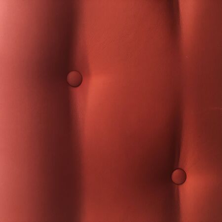 fun upholstery red leather pattern background. Cool textureの写真素材