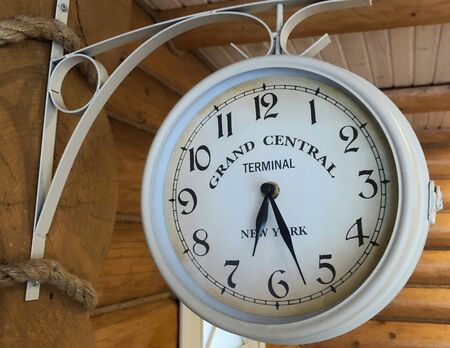 old clock vintage picture in wood background