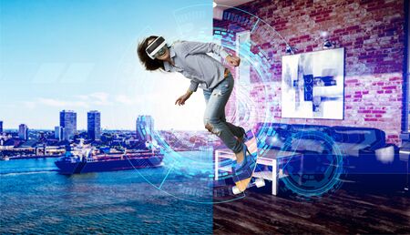 Young girl in a virtual helmet on a skateboard