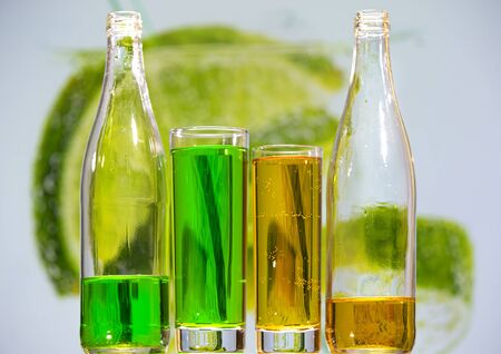 Glasses and bottles of sparkling water made from pear and tarragon