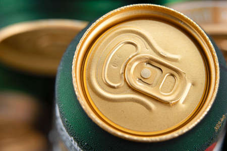 Chilled beer can covered with drops of water condensate