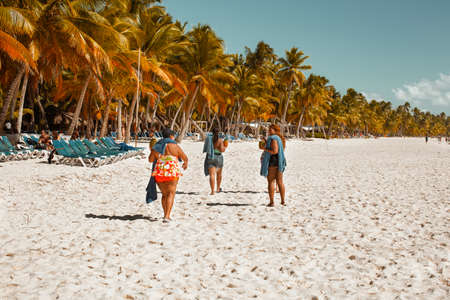 Saona Island, Dominican Republic - Dec. 08, 2018: tourists on the beach of Saona island