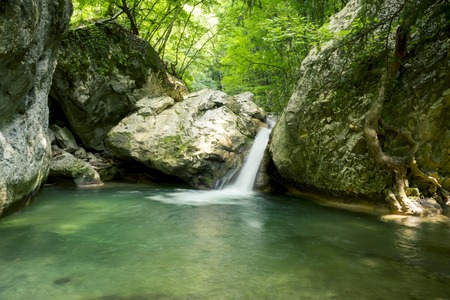 Waterfall on a mountain river of Crimean Grand Canyonの写真素材