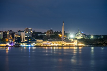 Monument on the night Sevastopol shoreの写真素材