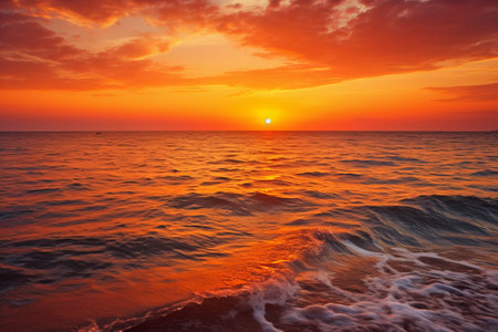 Calm sea with sunset sky and sun through the clouds over. Meditation ocean and sky background. Tranquil seascape. Horizon over the water.の素材