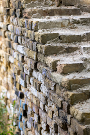 View of the destroyed ancient brick wallの写真素材