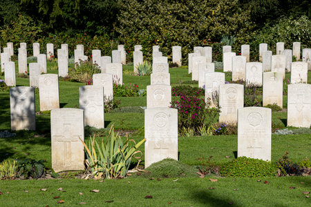Ehrenfriedhof World War II military cemetery in Cologne. White gravestones of the cemetery of honor...